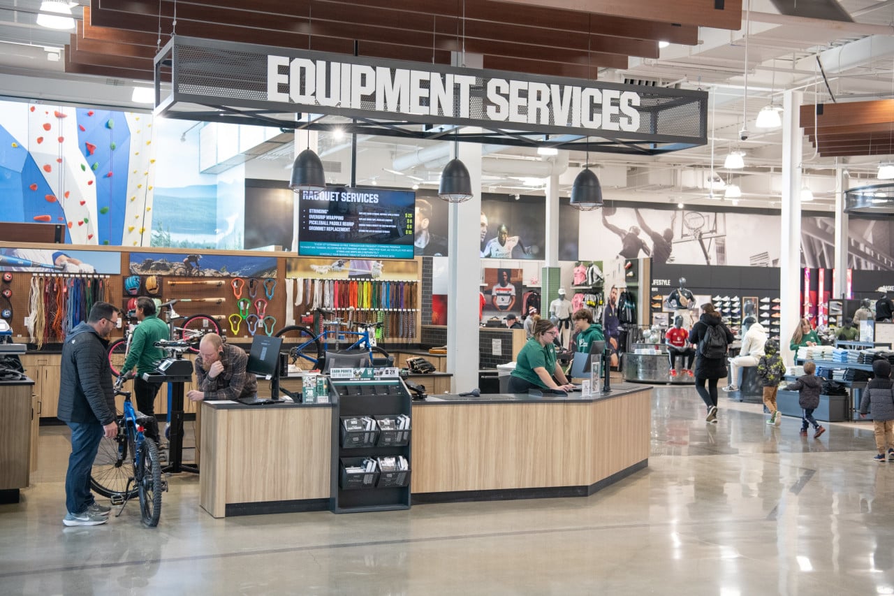 Dick's Sporting Goods beats on sales but cuts profit outlook as Foot Locker costs bite